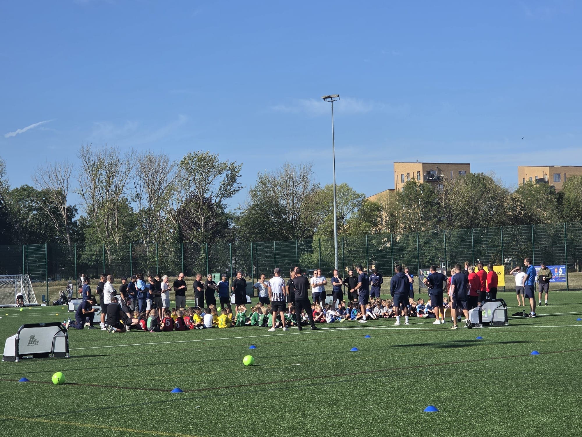 Coaches and parents with players at a tournament
