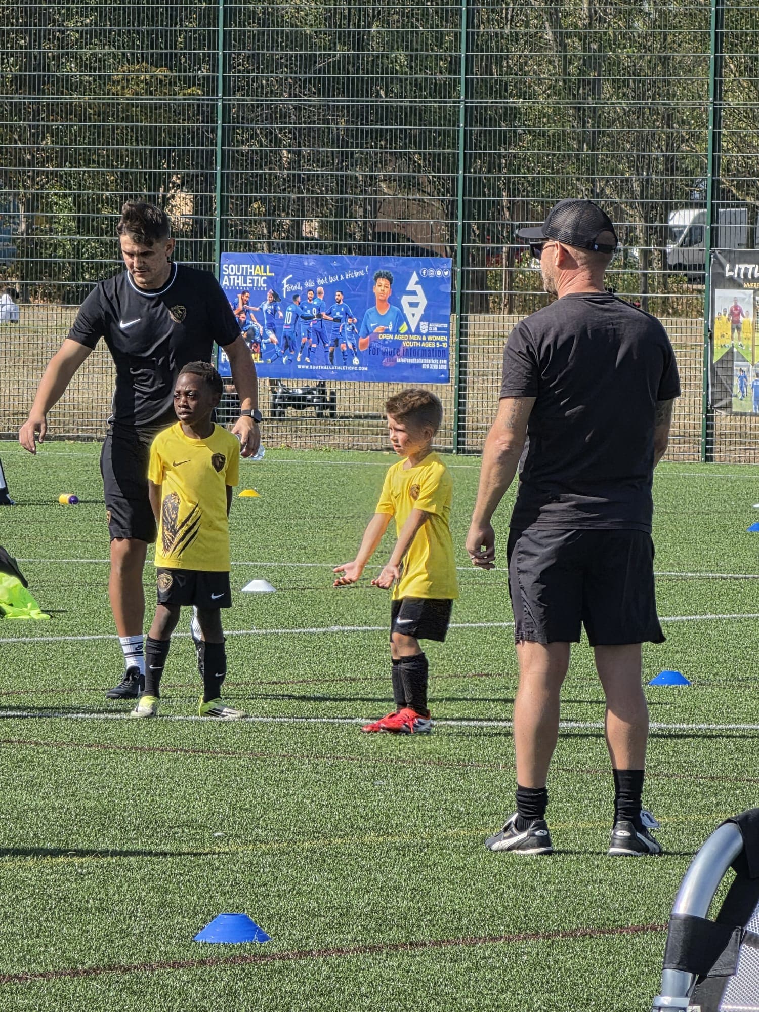 Coach running a drill with players